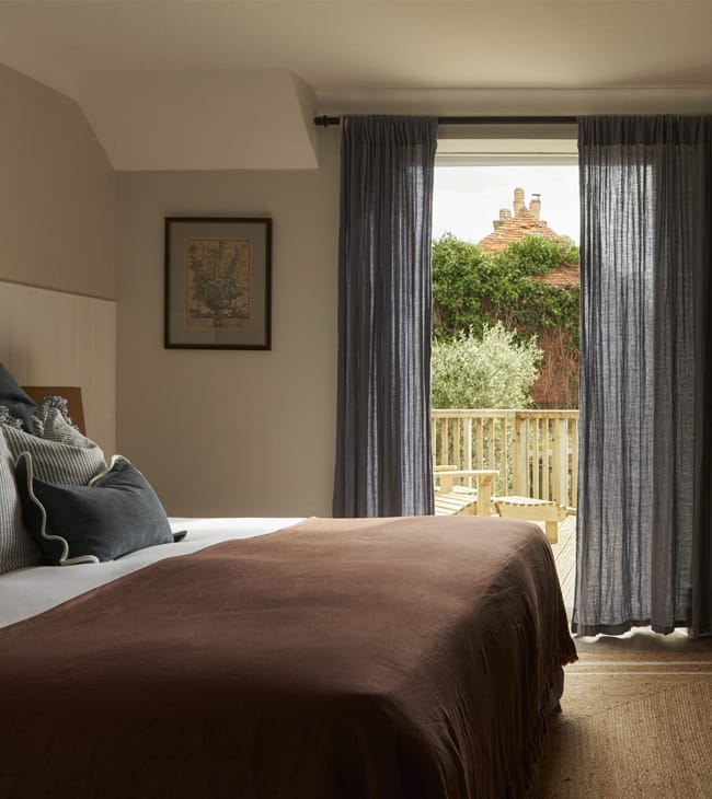 Dog-friendly hotel room with balcony at The Lodge Lulworth Cove